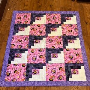 Dora the explorer with her monkey boots pink and purple quilt